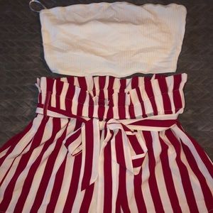 Red paper bag shorts with a white tube top